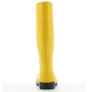 Ủng Safety Jogger Apollo màu vàng nhìn thẳng từ phía sau, thân thon ôm bắp chân, gót đế đen có gờ tháo ủng