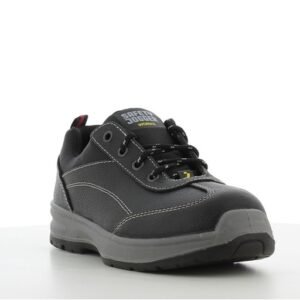 Giày Bestgirl S3 góc 3/4 phía trước, mũi tròn bọc đế xám che mũi thép, logo Safety Jogger trên lưỡi gà, dây buộc đen
