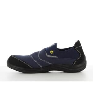 Mặt trong giày Safety Jogger Yukon vải dệt xanh navy, nhãn tròn vàng gần gót, chỉ may sáng uốn lượn, đế PU/PU đen mỏng